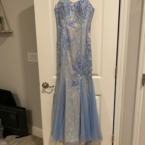 Really pretty ice blue prom dress. Spaghetti straps.